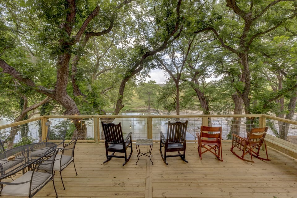 View of the River from the Sliding Glass Doors in the Back of the House