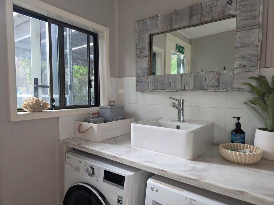 Laundry with overflow vanity