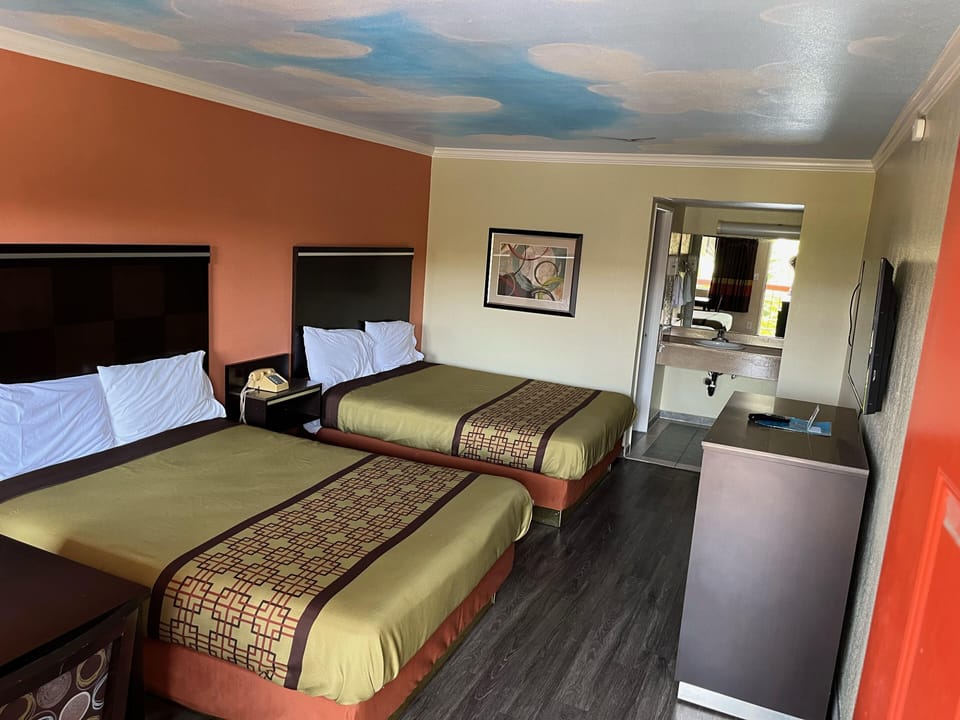 Desk, laptop workspace, free WiFi, bed sheets