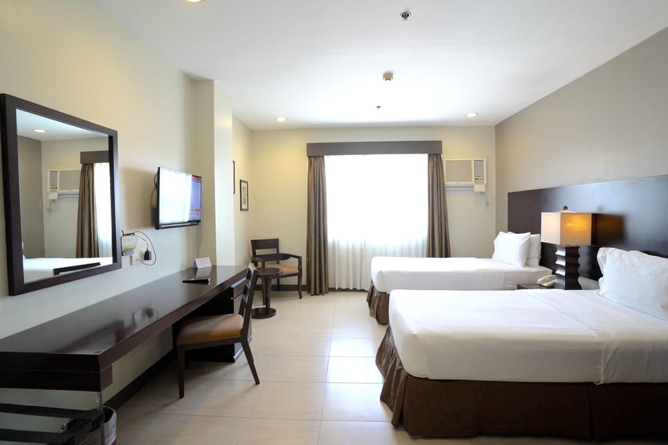 Deluxe Suite | Premium bedding, down comforters, desk, blackout drapes