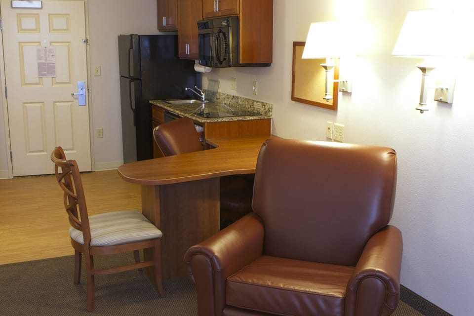 Studio Suite, 1 Queen Bed | Pillowtop beds, individually furnished, desk, laptop workspace