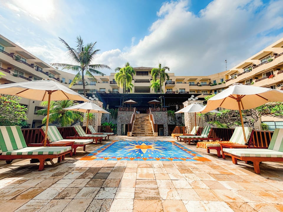 Outdoor pool, open 8 AM to 9:00 PM, pool umbrellas, sun loungers