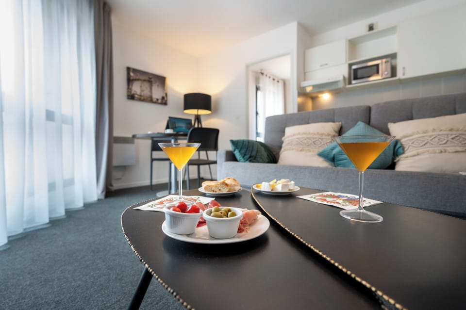 Standard Apartment, 1 Bedroom | Living area | Flat-screen TV