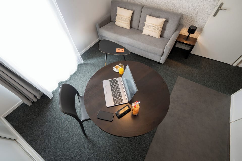 Standard Apartment, 1 Bedroom | Living area | Flat-screen TV