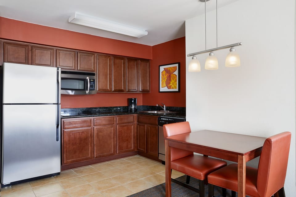 Full-size fridge, microwave, stovetop, dishwasher