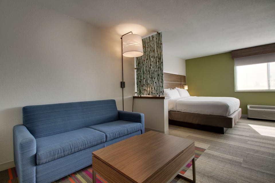Suite, 1 King Bed, Non Smoking | Desk, iron/ironing board, free WiFi, bed sheets