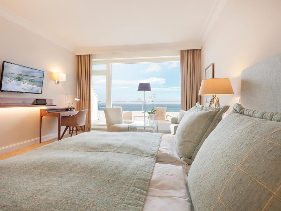 Deluxe Double Room, Sea View | Down comforters, minibar, in-room safe, individually furnished