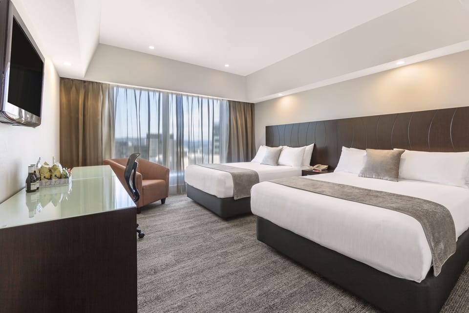 Executive Twin Room | Desk, blackout drapes, iron/ironing board, free cribs/infant beds