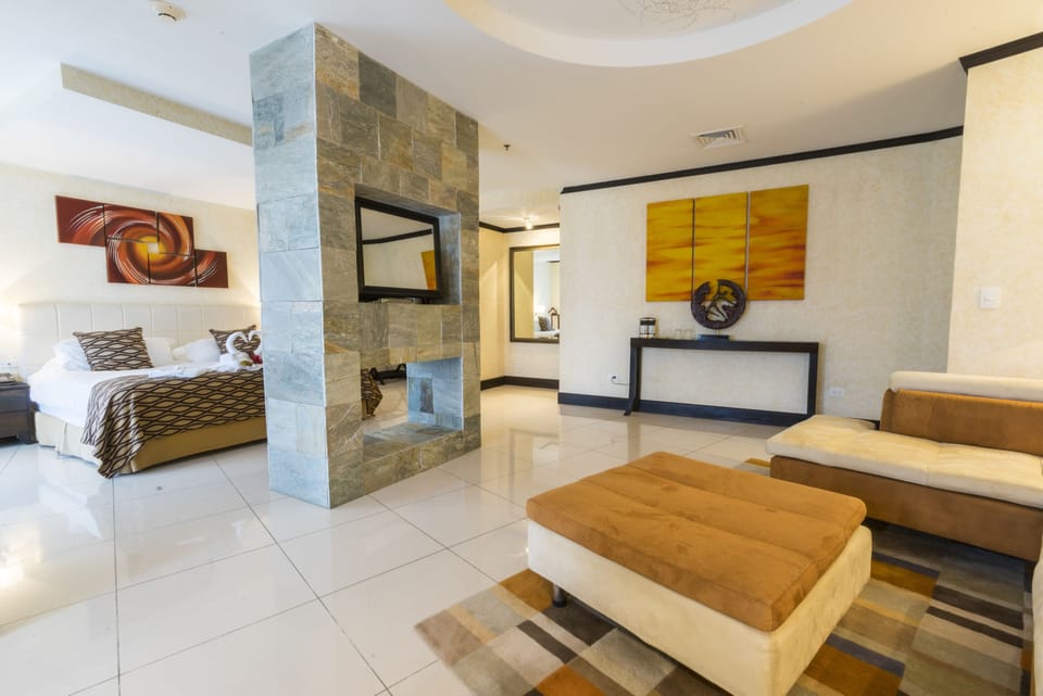 Master Suite Volcano View | Living area | LED TV