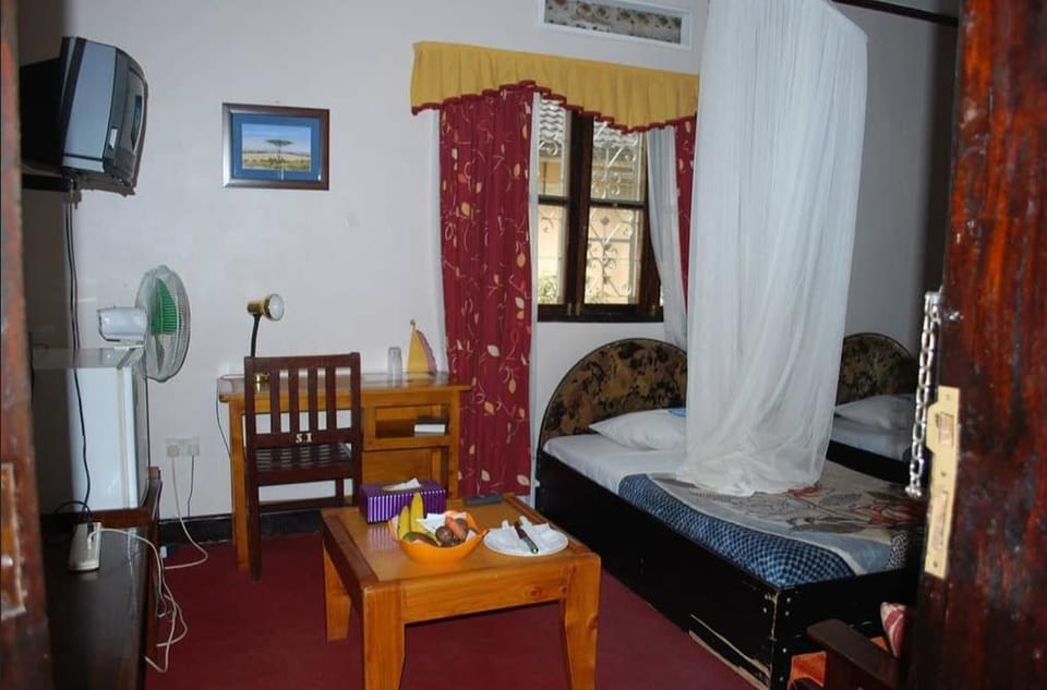 Desk, iron/ironing board, cribs/infant beds, rollaway beds