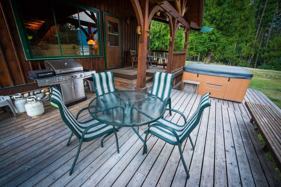 Quality large stainless steel BBQ with rotisserie, convenient for alfresco cooking and dining. Patio deck furniture to enjoy summer mornings for breakfast and leisurely evenings.
