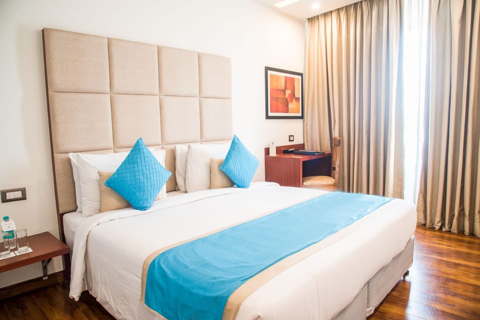 Superior Double Room, City View | Minibar, in-room safe, desk, soundproofing