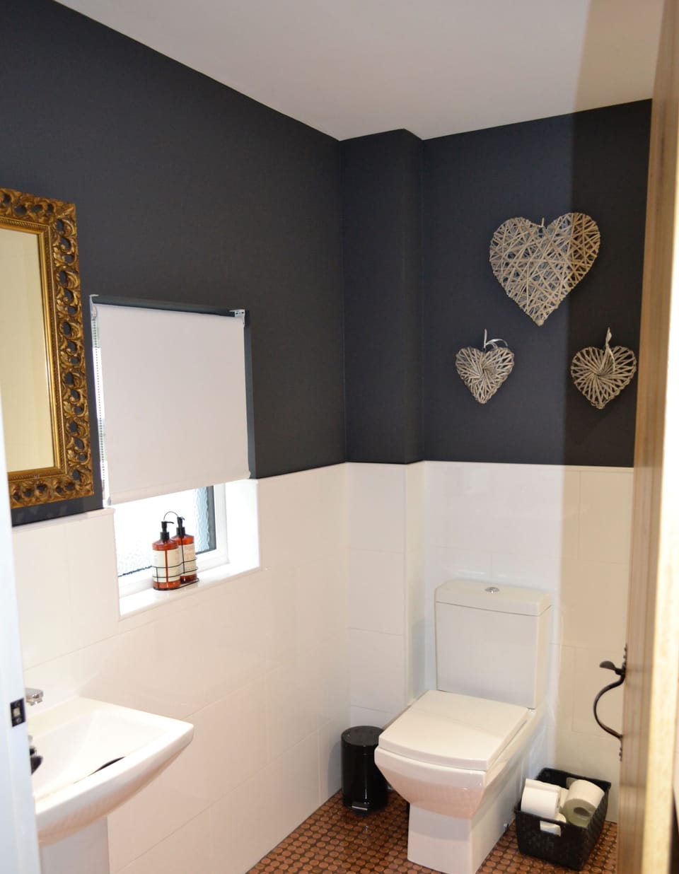 Very cool downstairs bathroom. Check out the penny floor