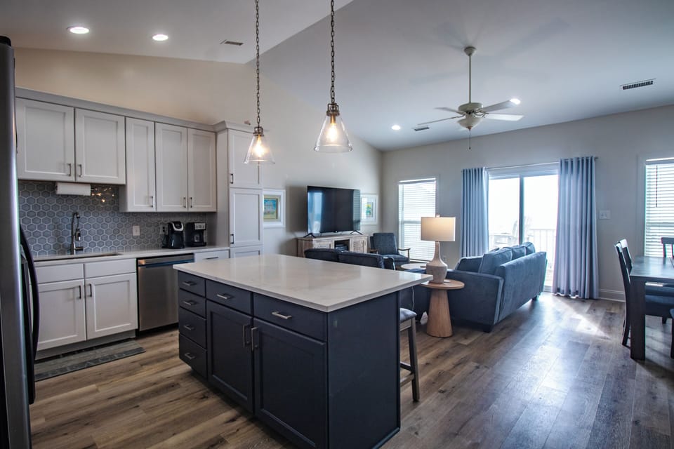 kitchen/living area overlooking the Atlantic-PLUS-new 65" TV, pendant lights!