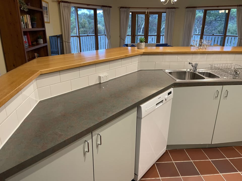 You can look from the kitchen over the dining area & the living area & beyond
