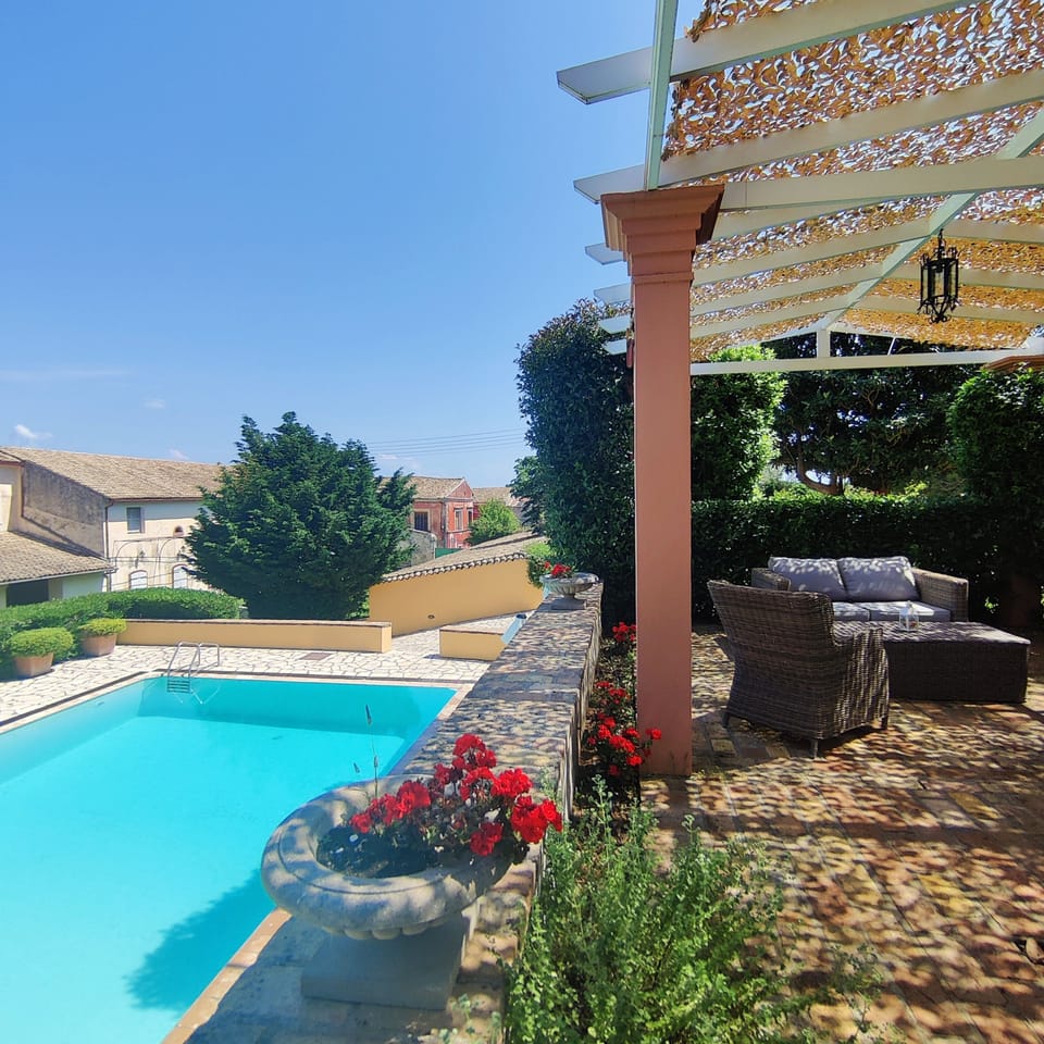 private terrace with swimming pool view 