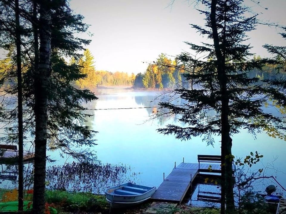 Morning Autumn view from cabin and with Private Dock, Row Boat and Kayaks. 