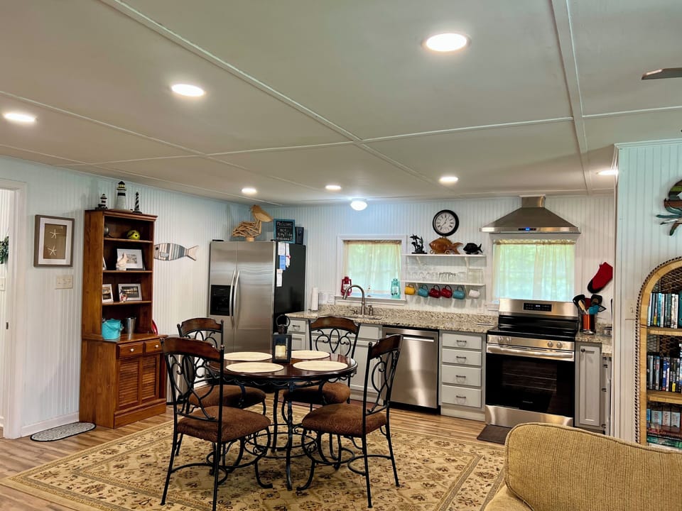 Freshly remodeled kitchen with new appliances and added lighting.