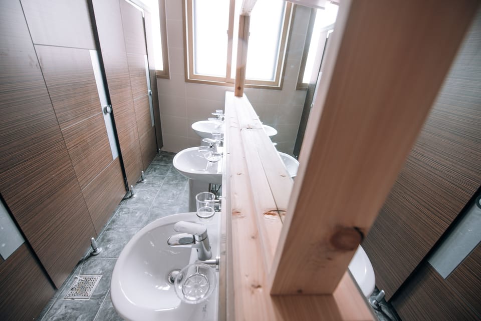 Shower, free toiletries, hair dryer, slippers