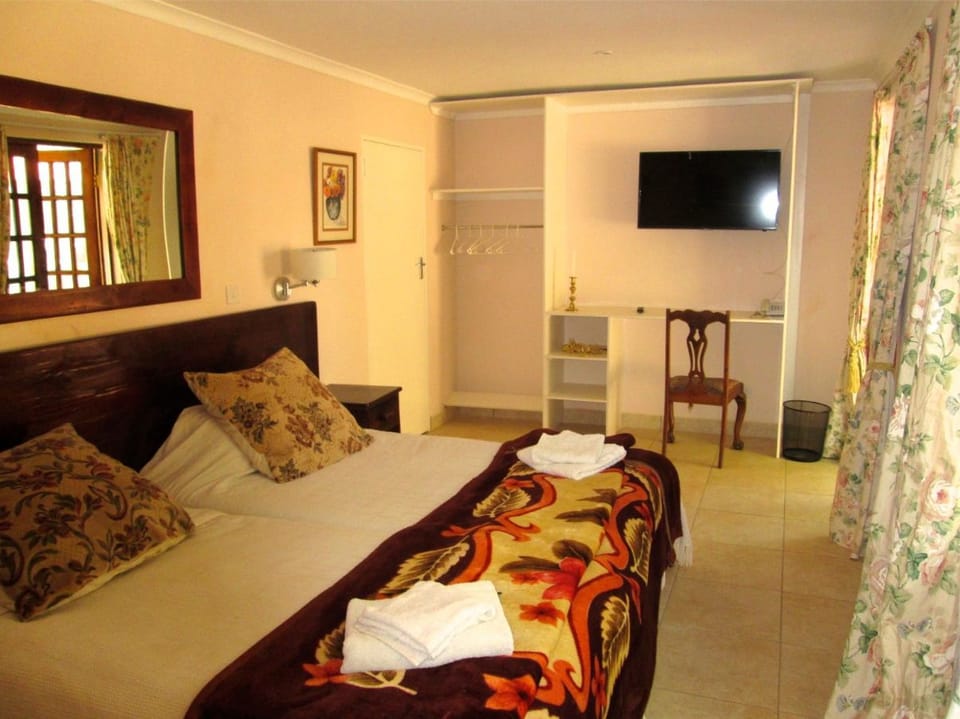 Double or Twin Room, 1 Bedroom, Ground Floor | In-room safe, desk, blackout drapes, iron/ironing board