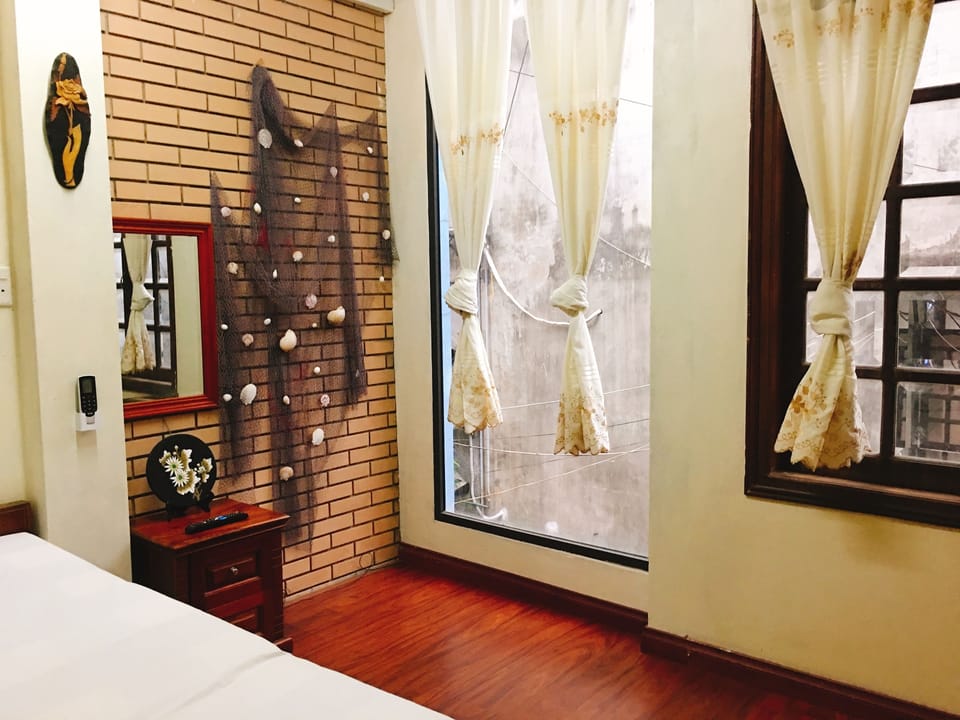 Deluxe Double Room, Garden View (Sea Style) | Desk, blackout drapes, iron/ironing board, free WiFi