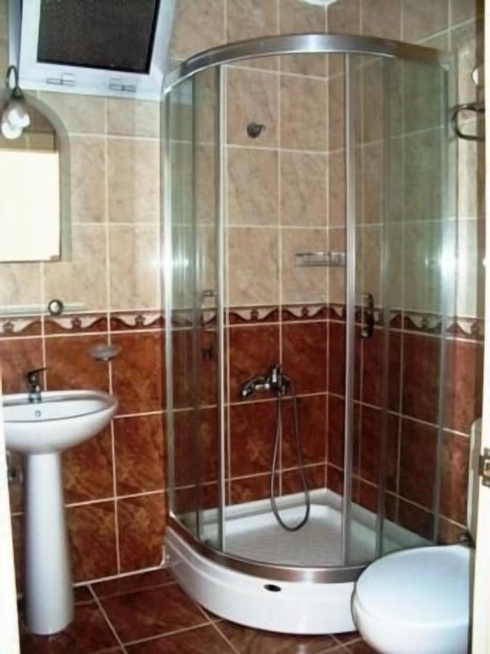 Shower, free toiletries, hair dryer, slippers
