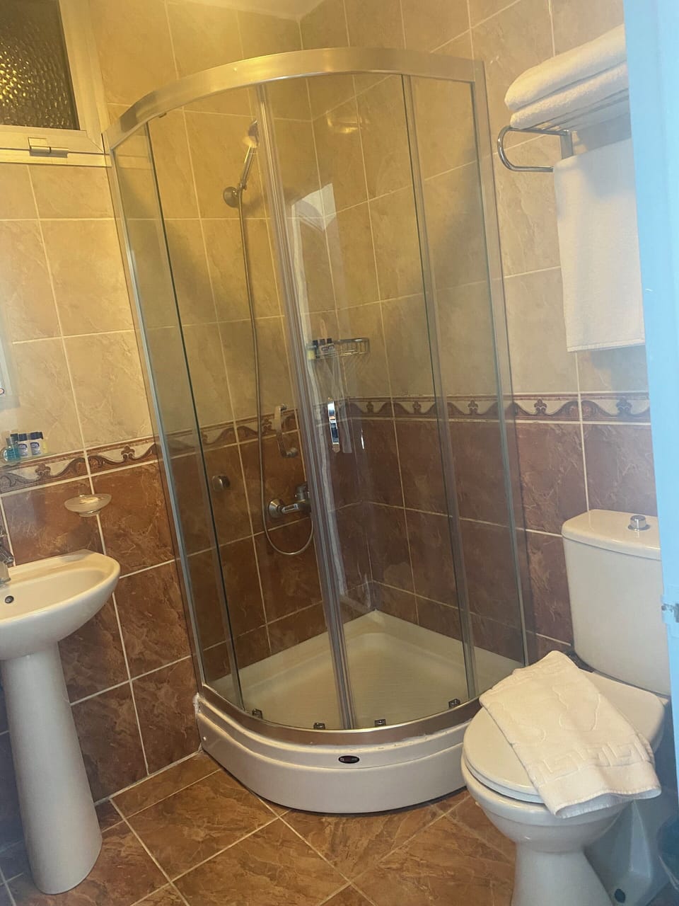 Shower, free toiletries, hair dryer, slippers