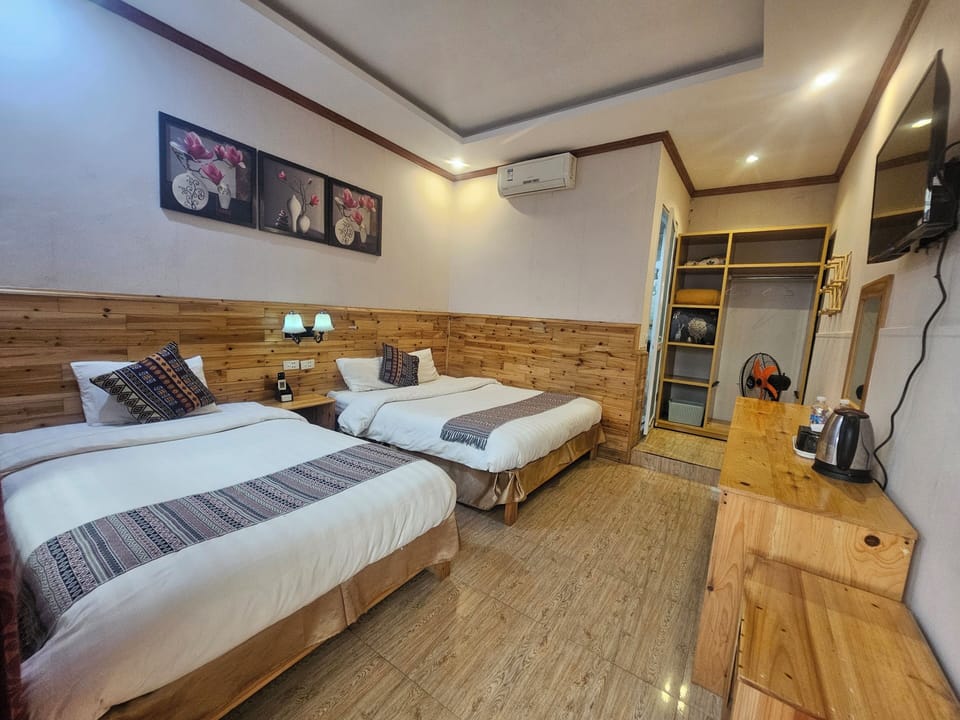 Family Twin Room | 1 bedroom, desk, laptop workspace, blackout drapes