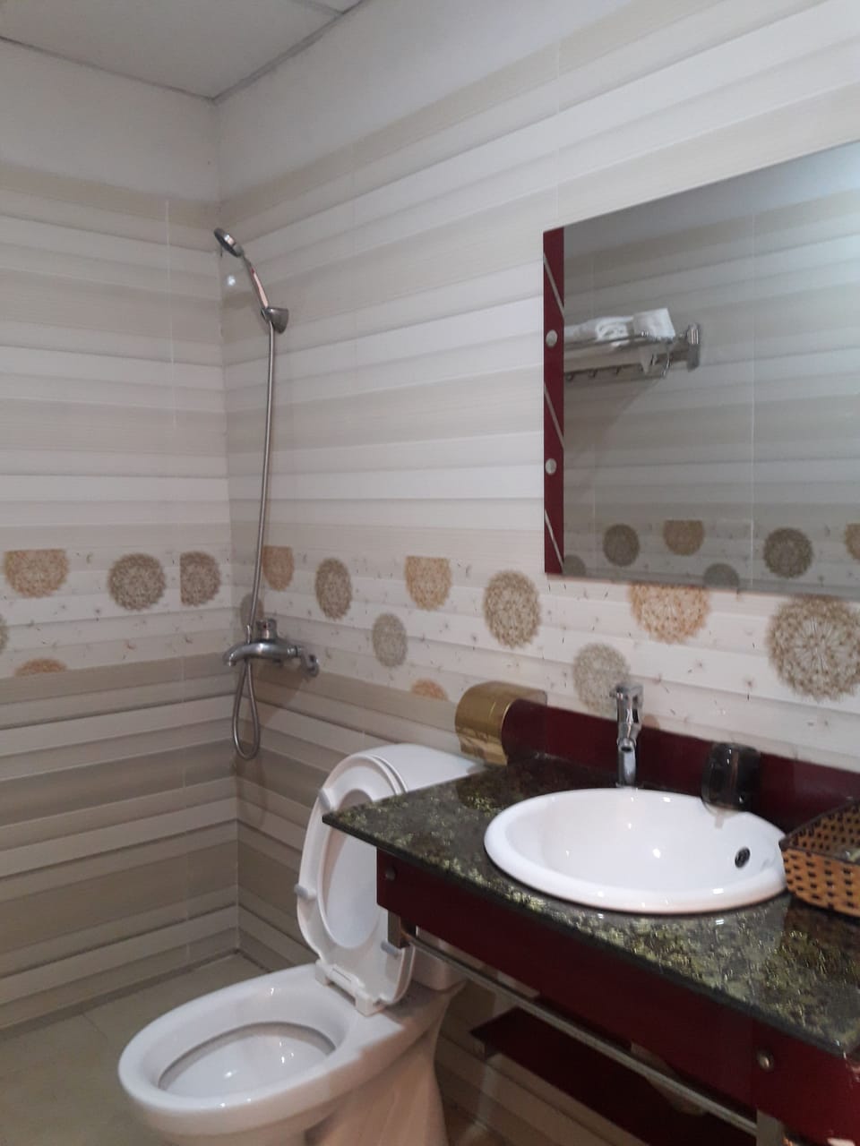 Shower, free toiletries, hair dryer, slippers