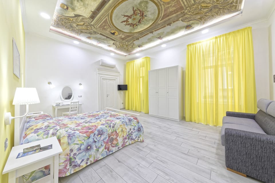 Classic Quadruple Room | Minibar, in-room safe, desk, soundproofing