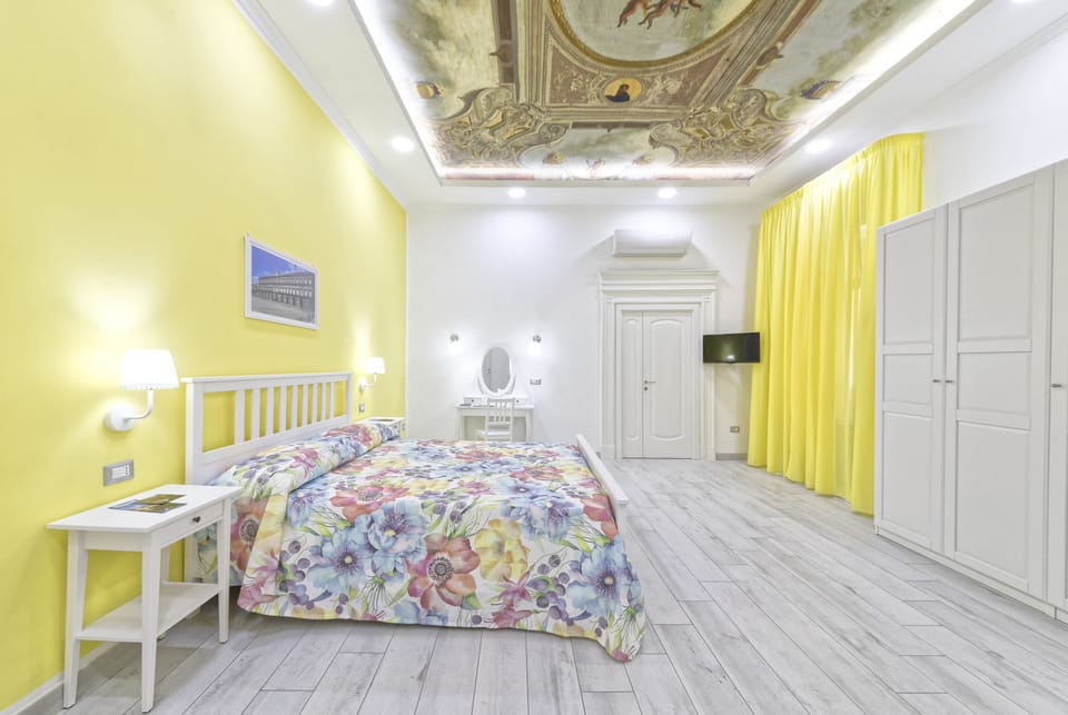 Classic Quadruple Room | Minibar, in-room safe, desk, soundproofing