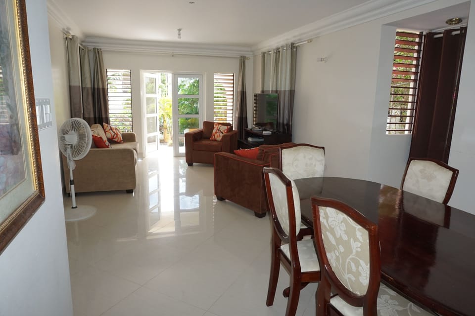 Townhome, 4 Bedrooms | Living area | Flat-screen TV