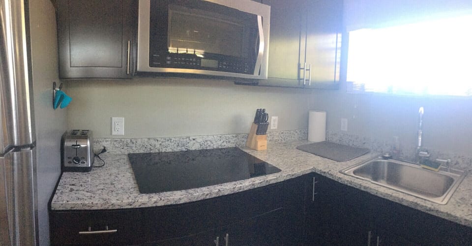 Fully functional kitchen. The sink has garbage disposal