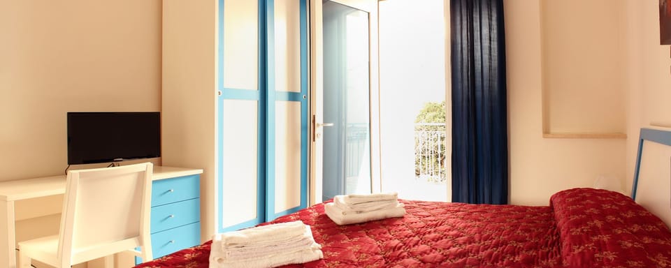 Double or Twin Room | Minibar, desk, free WiFi, bed sheets