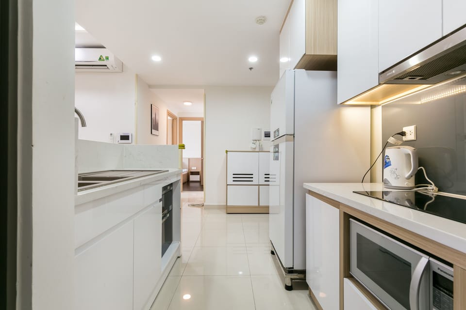 Full-size fridge, microwave, stovetop, rice cooker