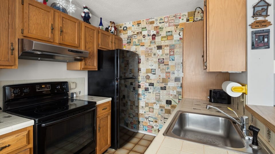 Condo, 2 Bedrooms | Private kitchen | Fridge, microwave, oven, dishwasher