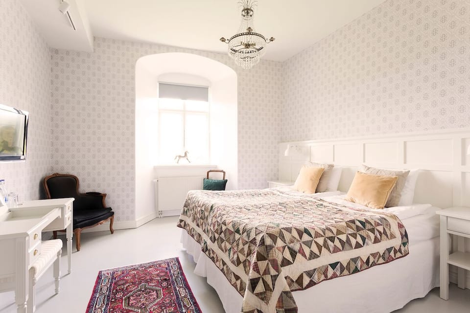 Double Room | Desk, blackout drapes, iron/ironing board, free cribs/infant beds