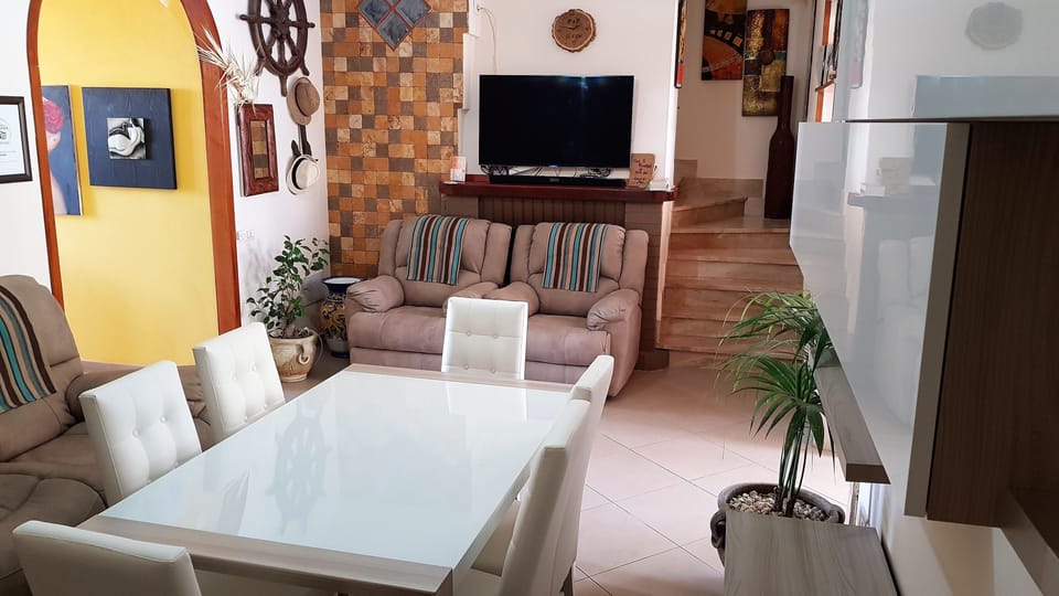 Classic Double Room | Living area | Flat-screen TV