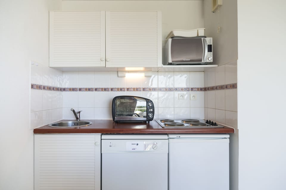 Fridge, oven, stovetop, espresso maker