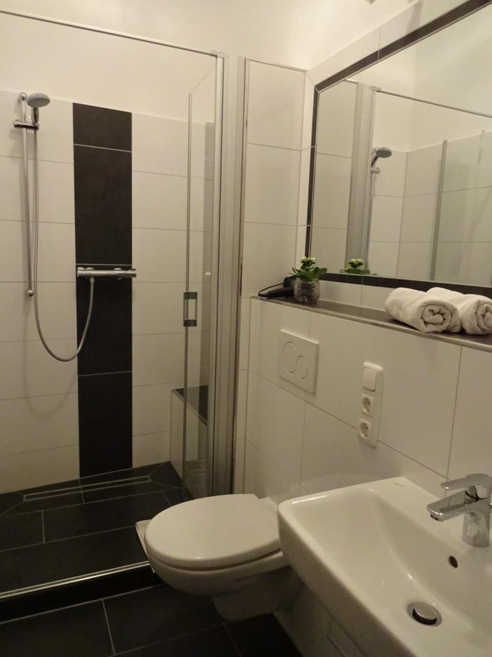 Shower, free toiletries, hair dryer, towels