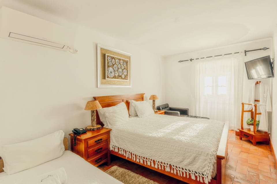 Family Double Room | 1 bedroom, premium bedding, minibar, in-room safe