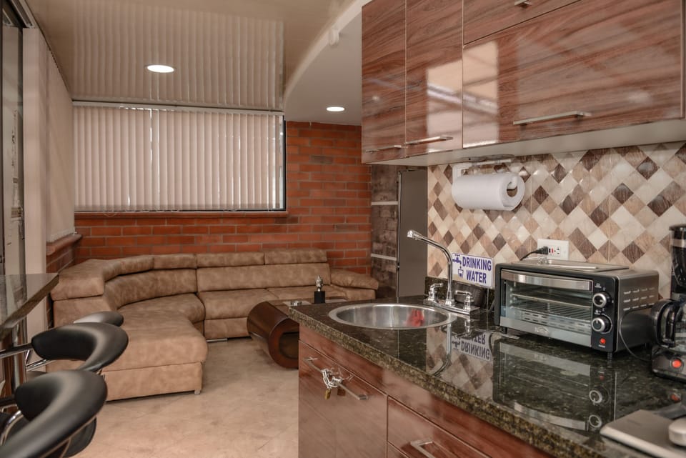 Apartment, 2 Bedrooms (402) | Living room | LCD TV