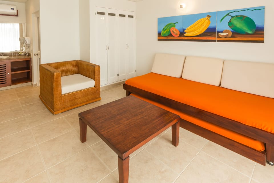 Standard Room | Living room | 42-inch TV with cable channels