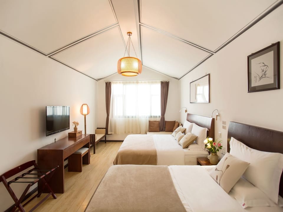 Family Room | Premium bedding, memory foam beds, in-room safe, desk