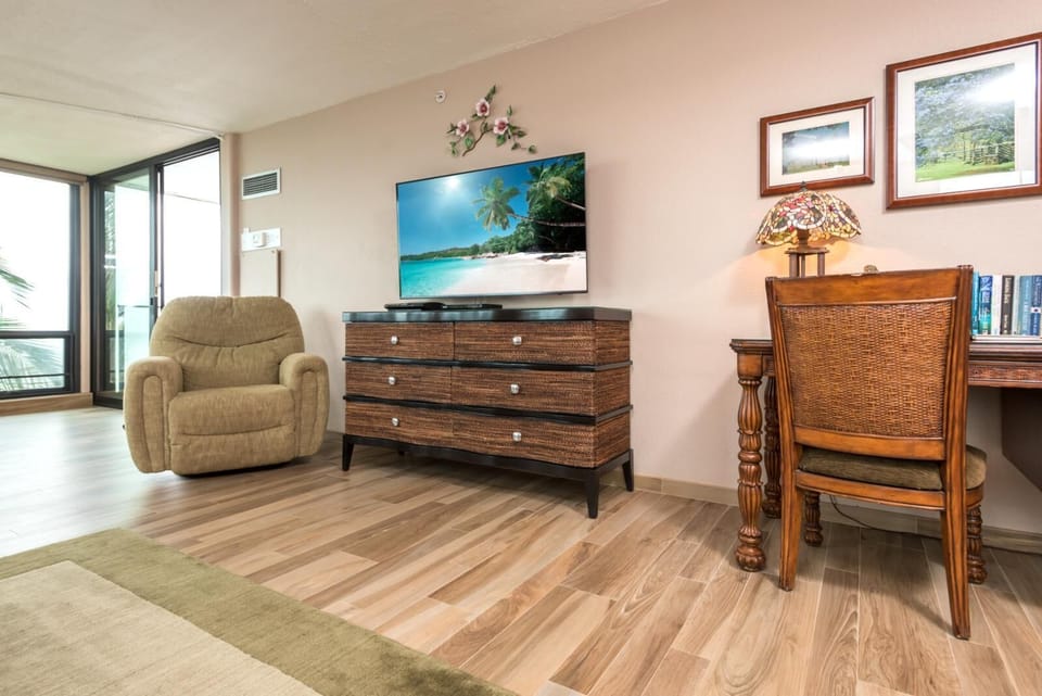 From couch to coastline, this unit offers front-row seats to ocean views and swaying palms that dance at dusk