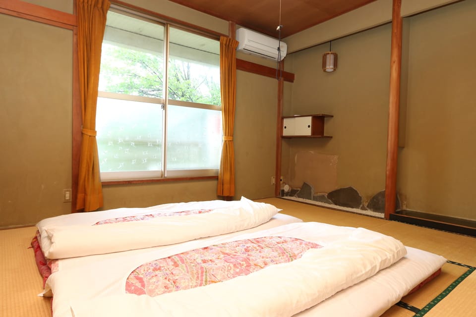 Economy Japanese Style Room with Shared Bathroom, Smoking | Bed sheets