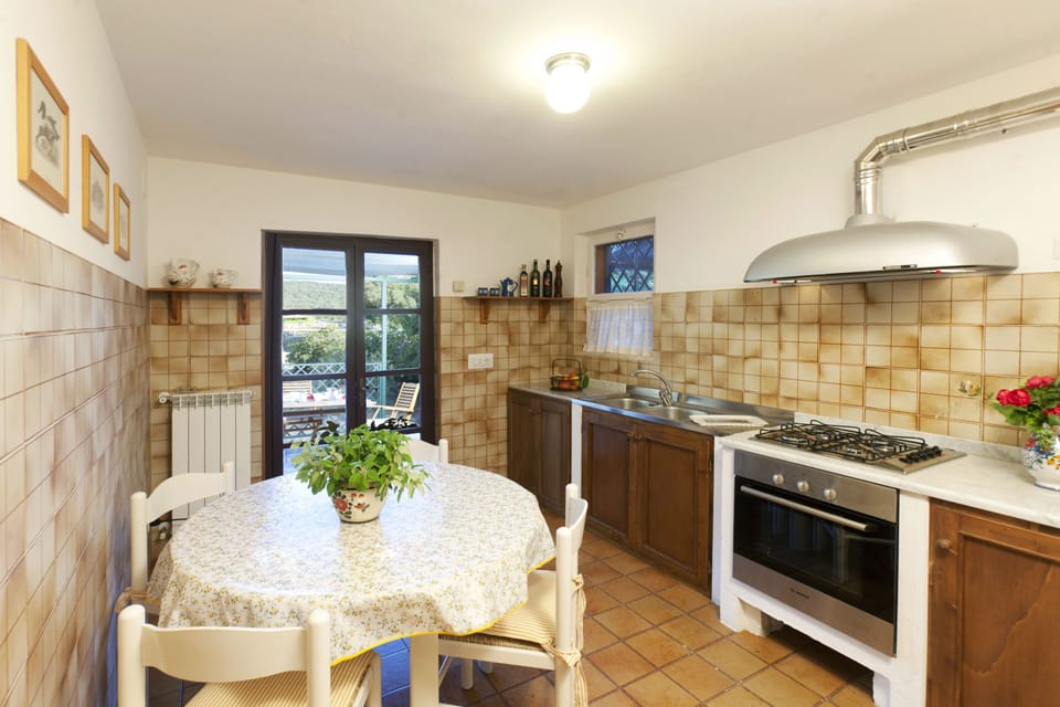 Apartment, 1 Bedroom | Private kitchen | Fridge, dining tables