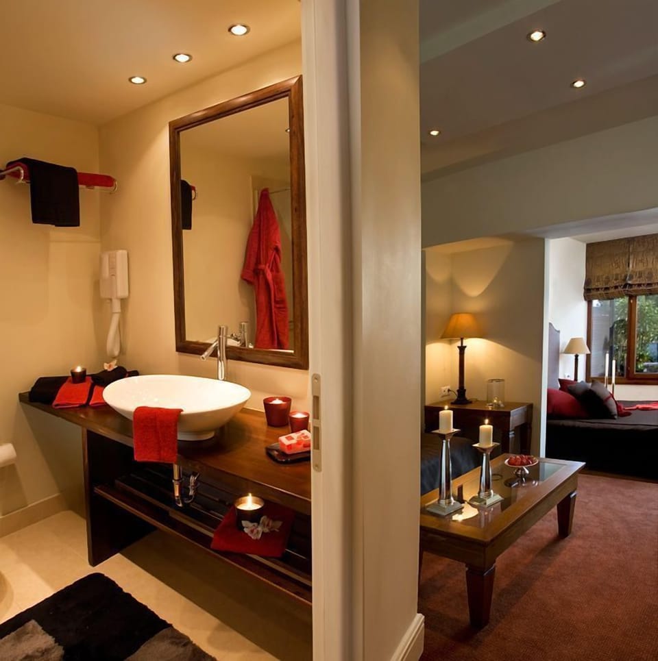 Junior Suite, Terrace, Pool View | Bathroom | Deep soaking tub, hair dryer, towels