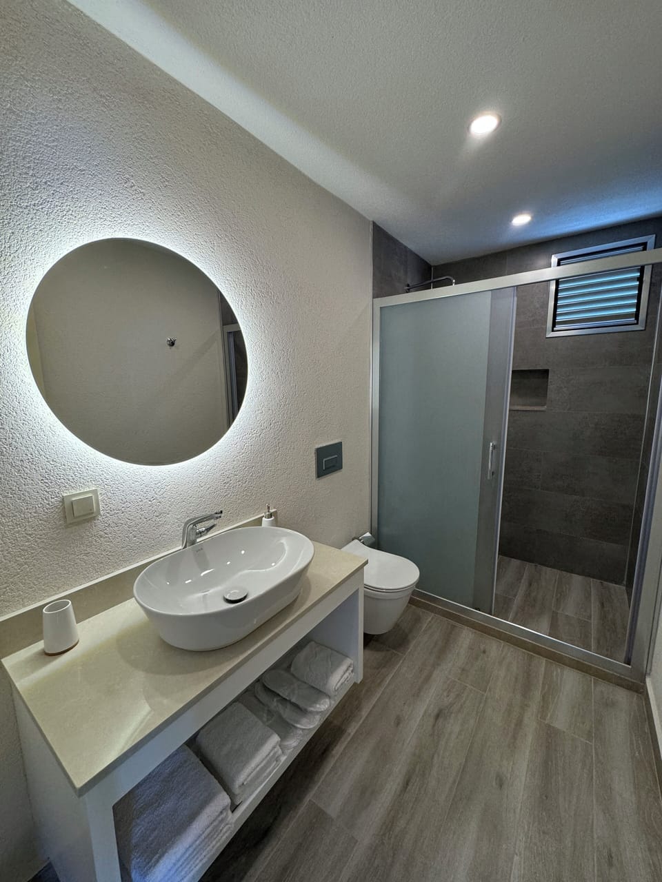 Comfort Suite, 1 Bedroom, Sea View | Bathroom | Shower, free toiletries, hair dryer, slippers