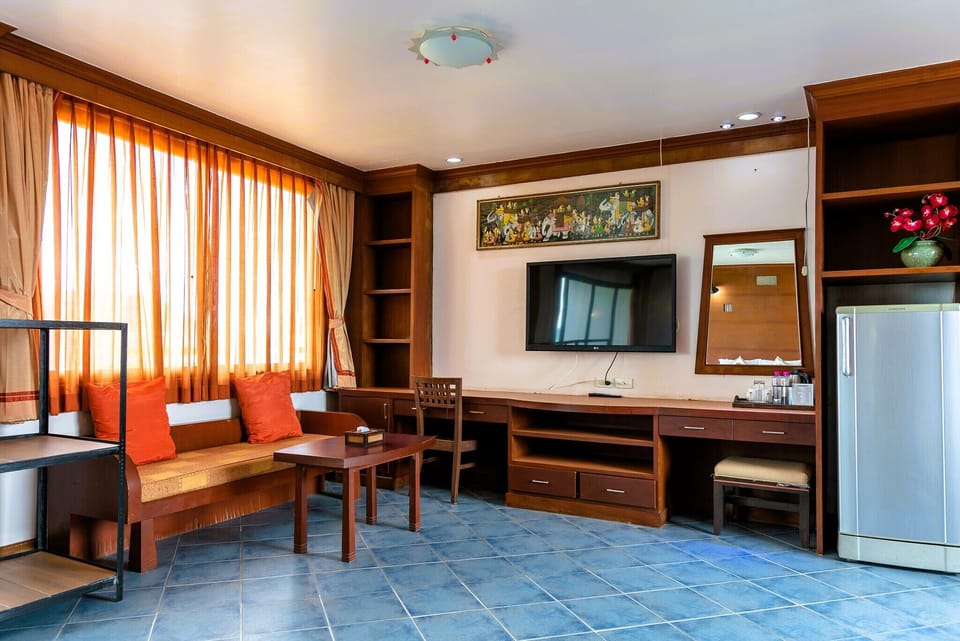 Premier Double Room with Ice Bath Experience | Living area | 26-inch TV with satellite channels